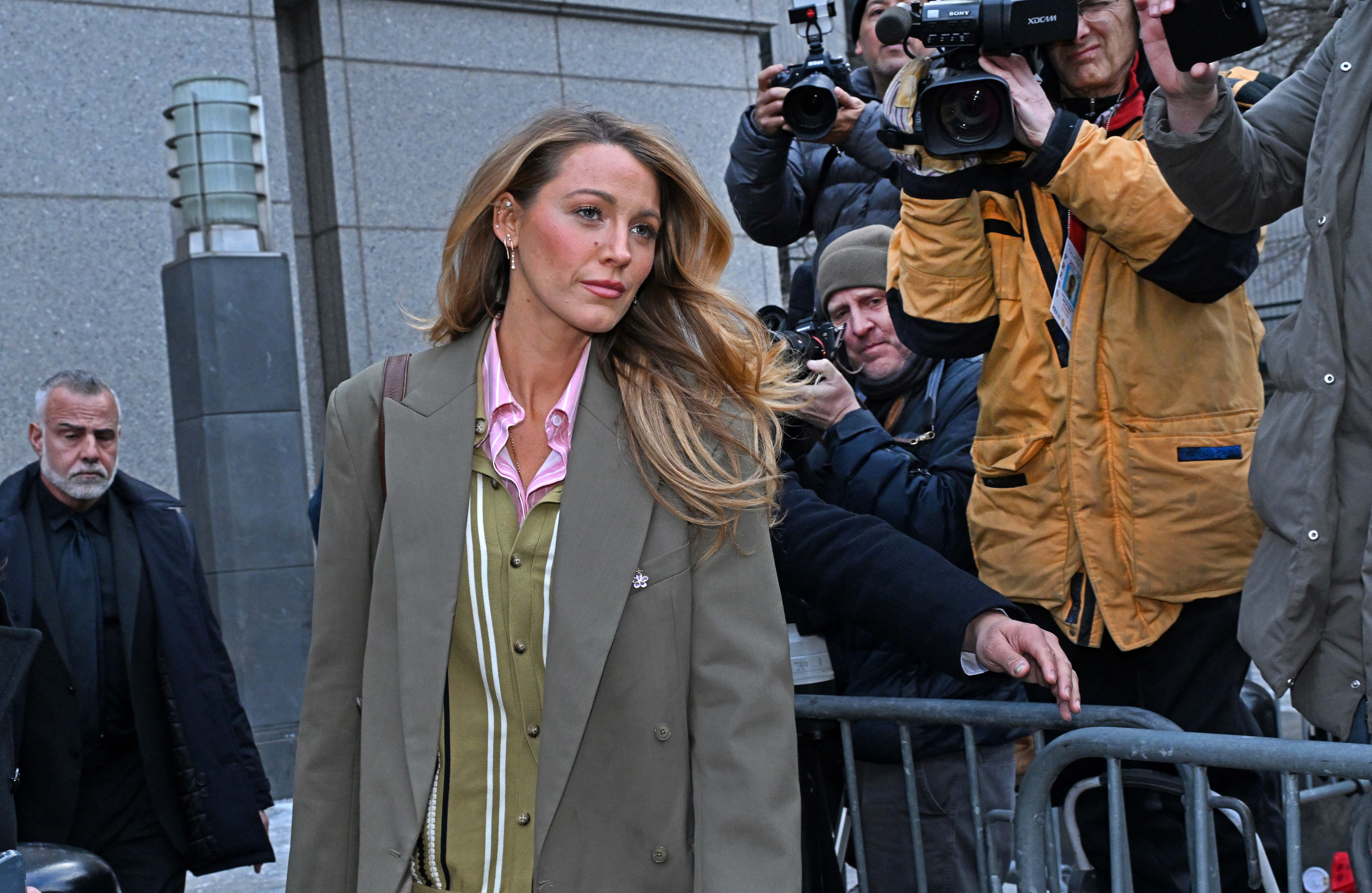 Blake Lively leaving federal court after a settlement conference.