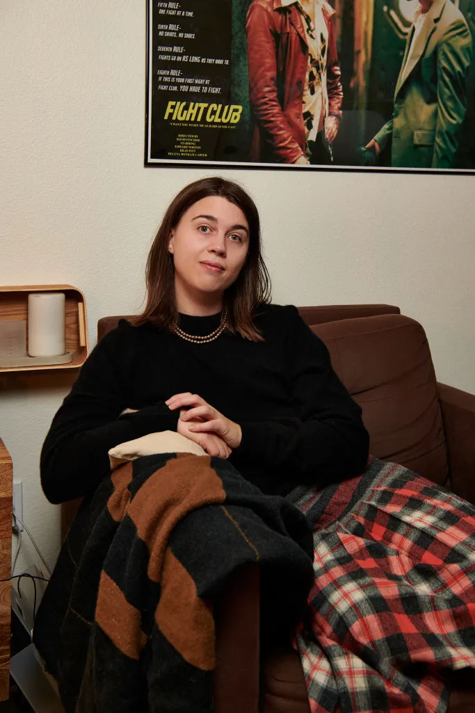 Camille Kiefel sitting in a chair with a blanket over her lap.