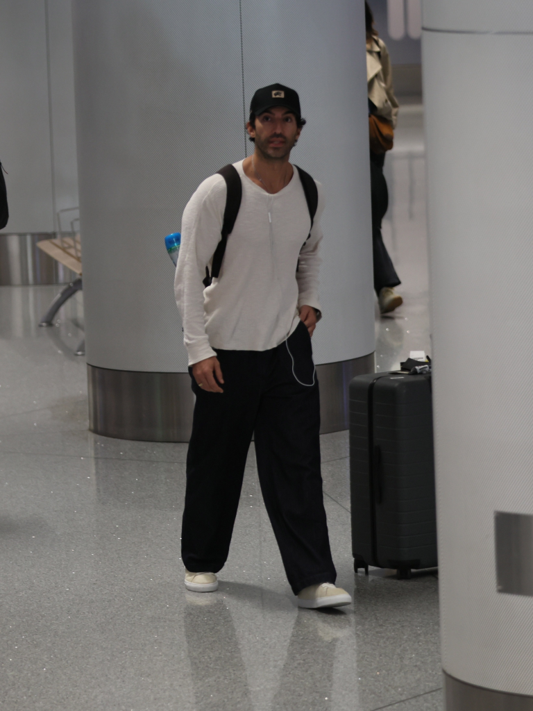 Justin Baldoni at an airport.