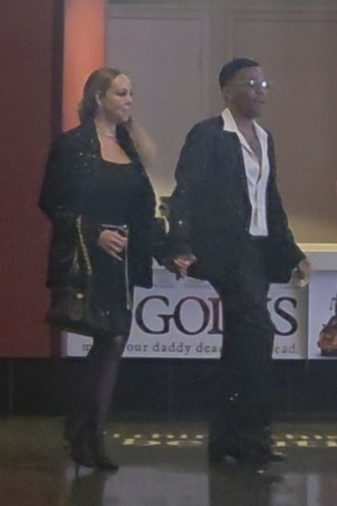 Mariah Carey and Anderson .Paak holding hands at Century City Mall.