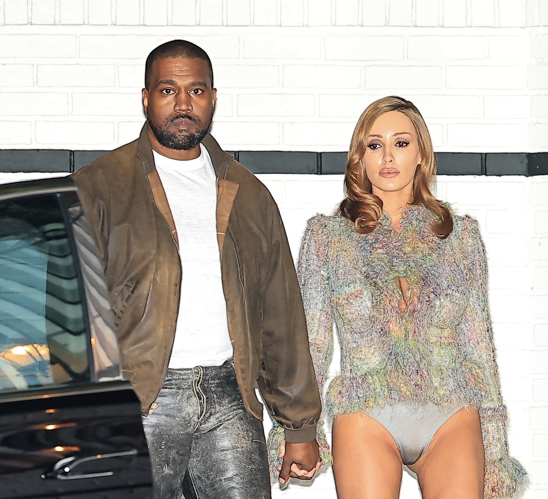 Kanye West and Bianca Censori holding hands after a late-night dinner.