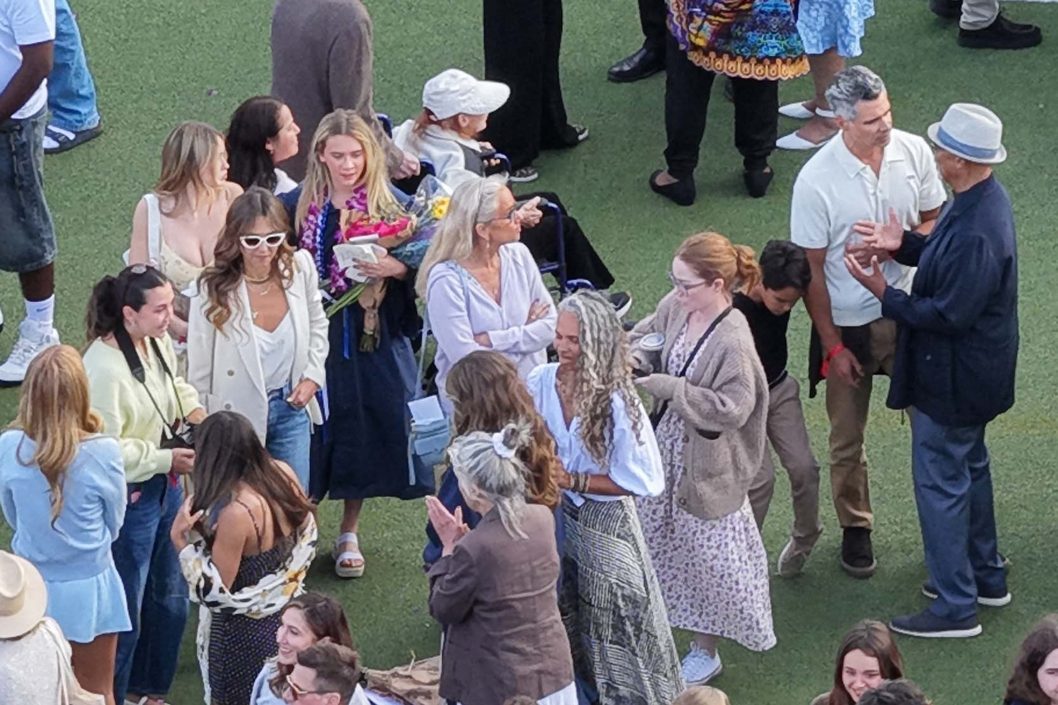 Jessica Alba and Cash Warren with others at their daughter Honor's graduation ceremony.