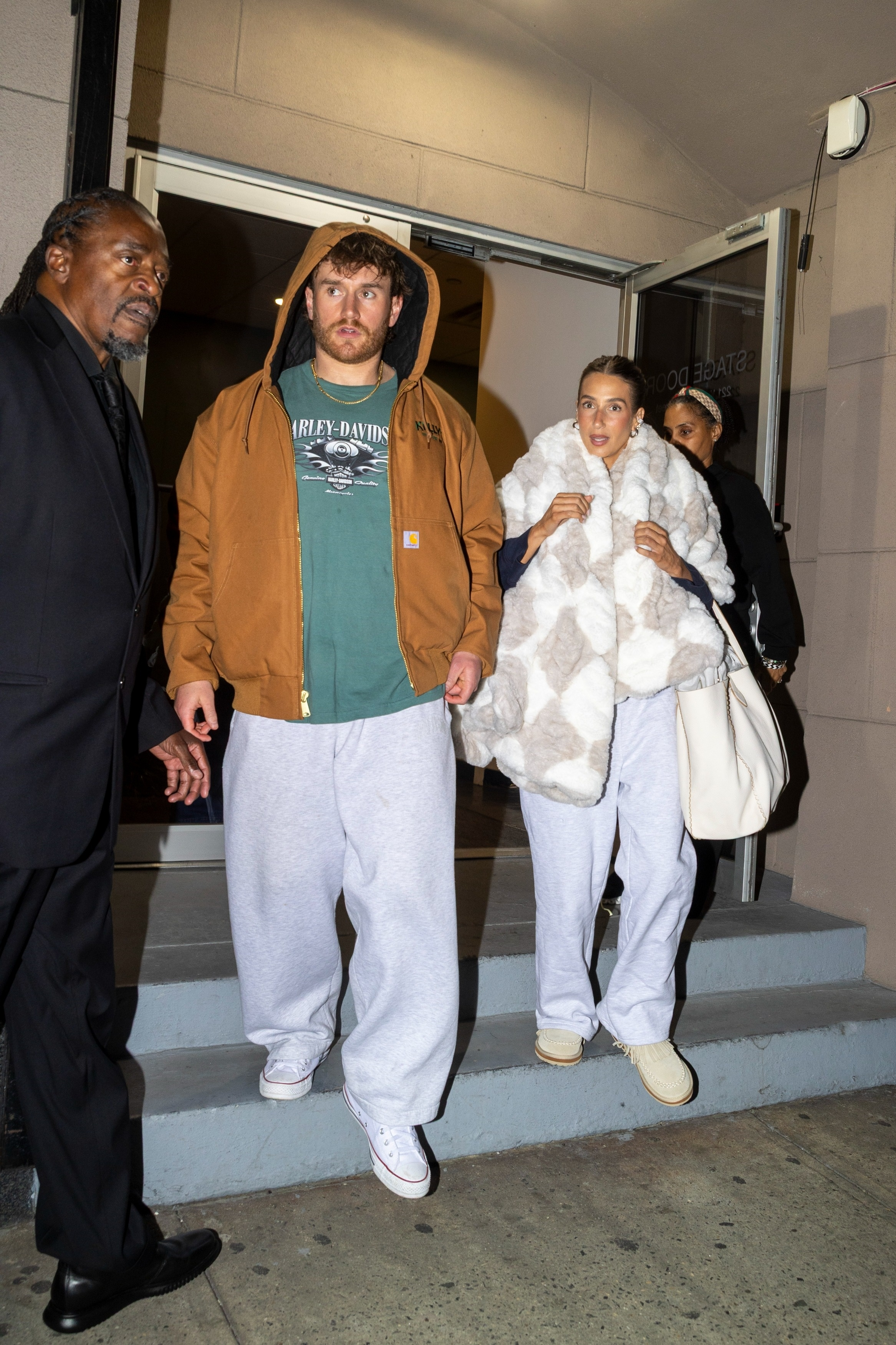 Amanda Batula and West Wilson exiting the Summer House reunion.
