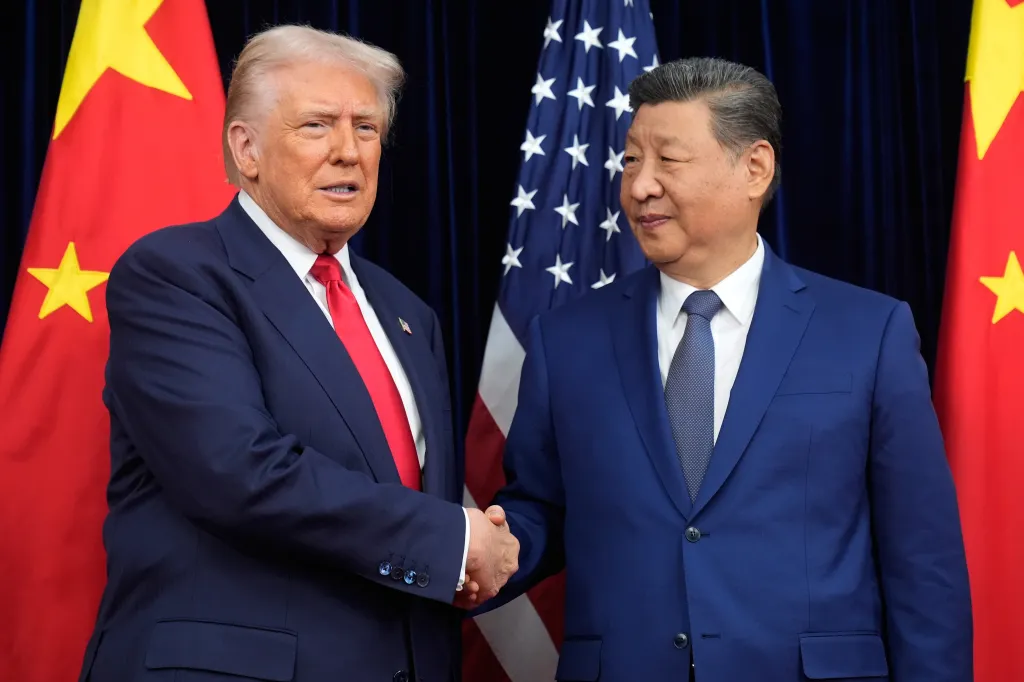 President Donald Trump shaking hands with Chinese President Xi Jinping.