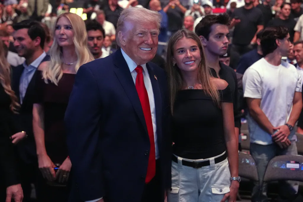 President Donald Trump and Kai Trump stand together at UFC 327.