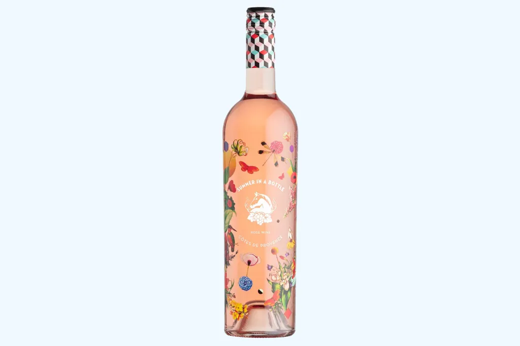 A bottle of Wolffer Estate Vineyard rosé wine with a floral illustration, labeled 