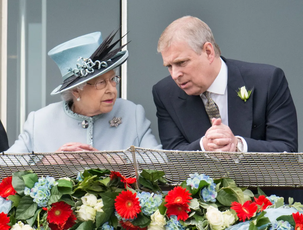 Queen Elizabeth II and Prince Andrew watching the racing at the Epsom Derby.