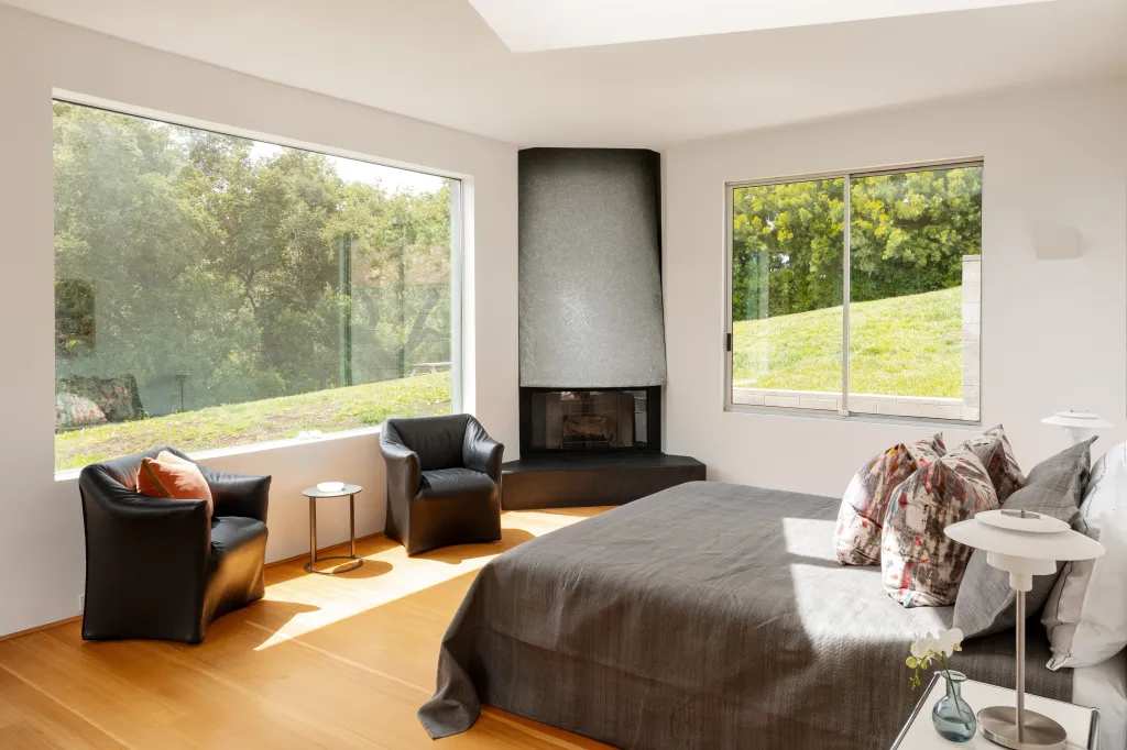 One of the sun-kissed bedrooms inside the statement dwelling.