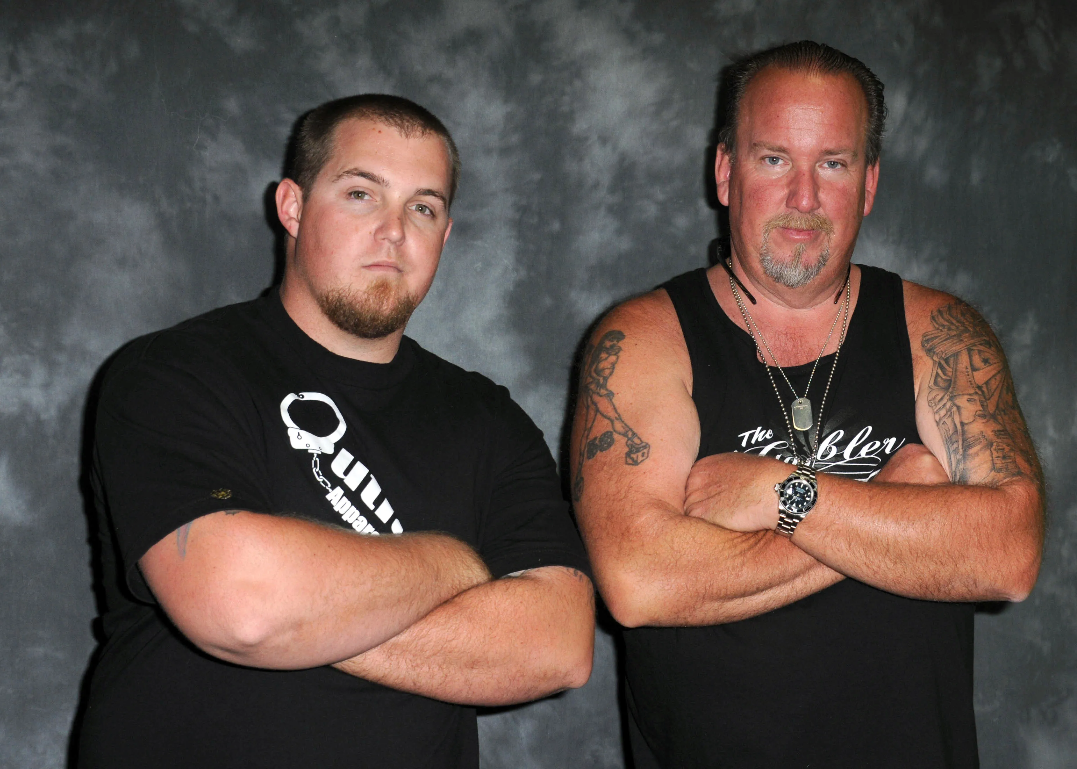 Reality stars Brandon Sheets and Darrell Sheets posing with arms crossed.