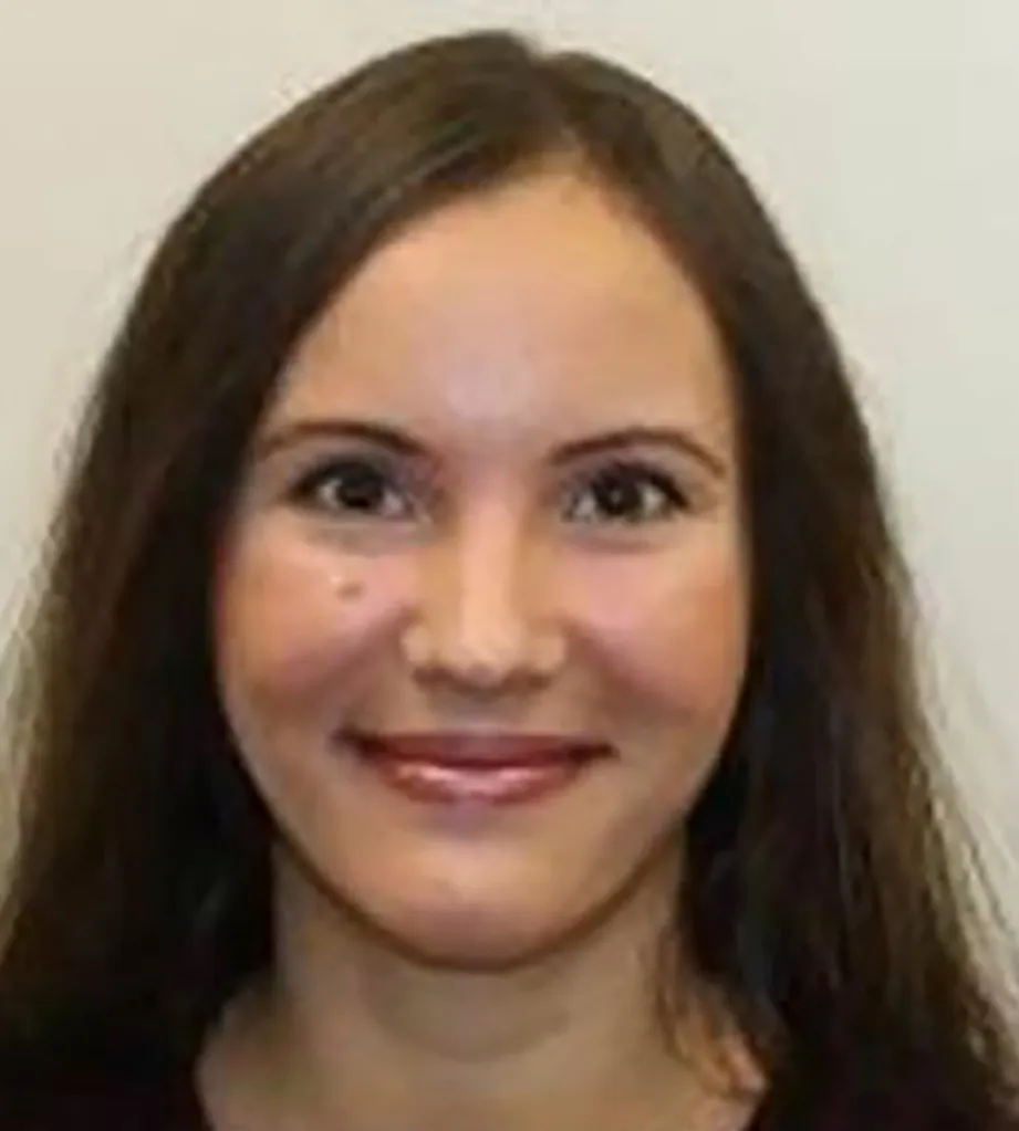 Rebeca Fratila-Ilies, convicted of child sexual abuse, looks at the camera.