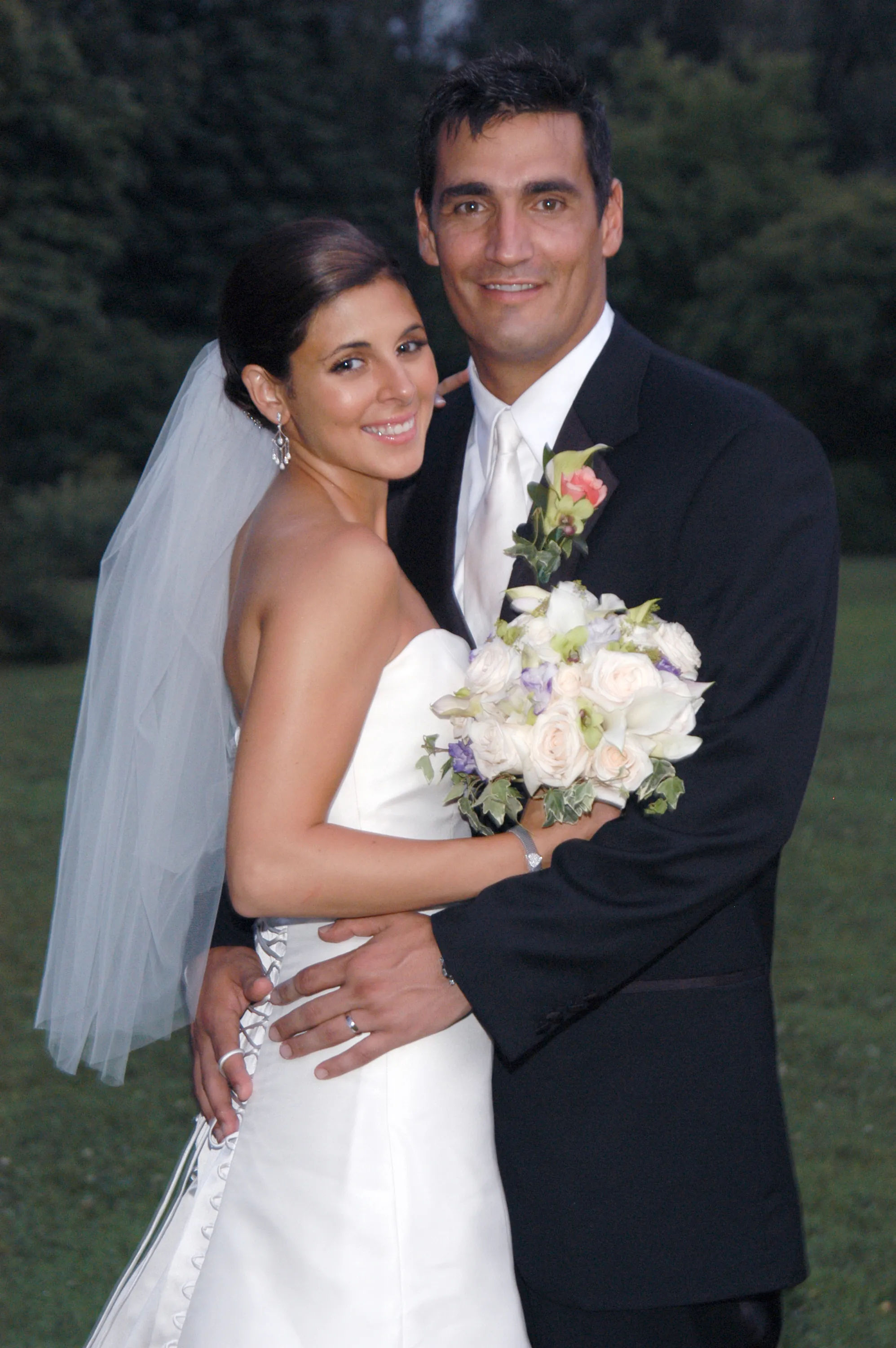 Jamie-Lynn Sigler and AJ DiScala at their wedding reception.