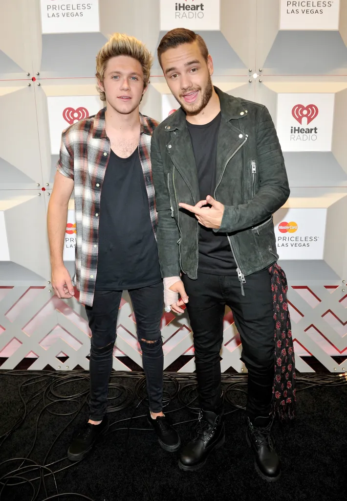 Niall Horan and Liam Payne of One Direction posing together at the 2014 iHeartRadio Music Festival.