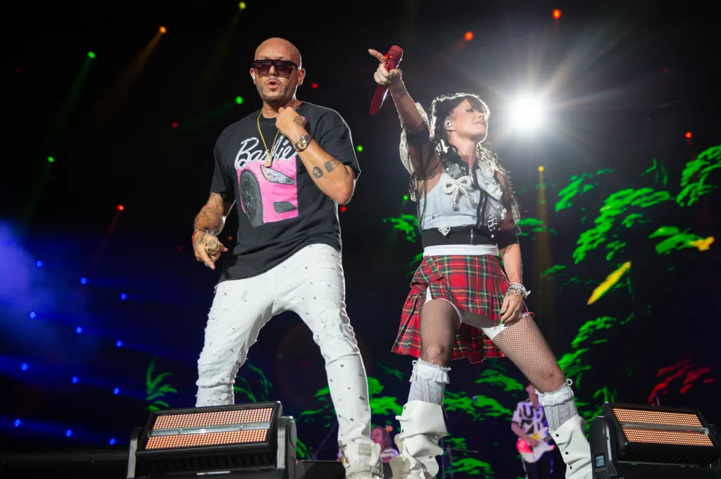 Rene Dif and Lene Nystrøm of Aqua performing on stage.