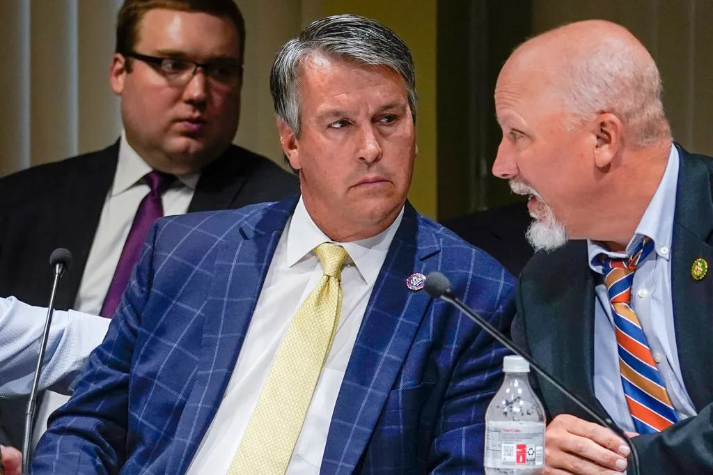 Rep. Barry Moore (center) and Rep. Chip Roy (right) attend a House Judiciary Committee Field Hearing.