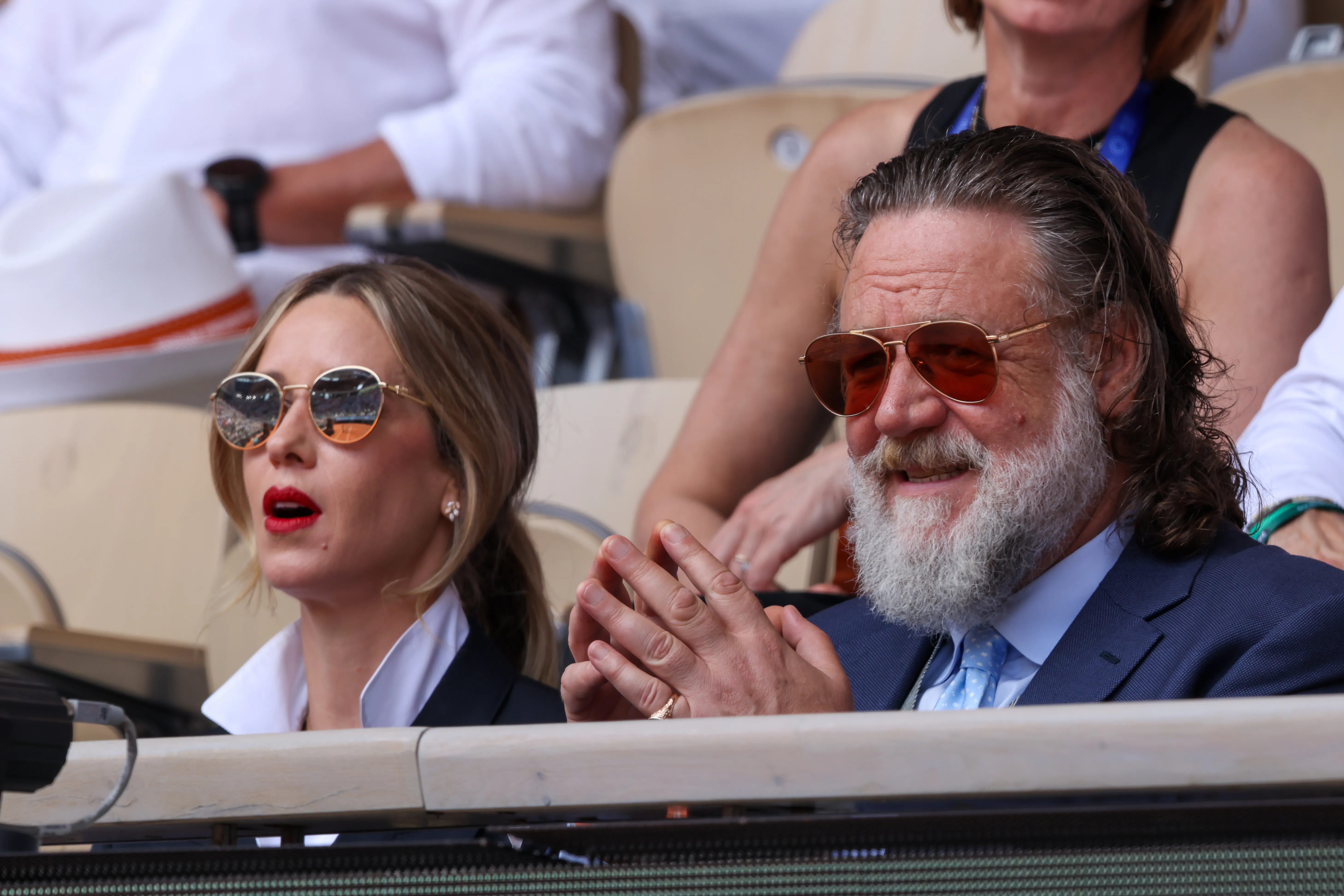 Russell Crowe and Britney Theriot attend Day One of the 2026 French Open.