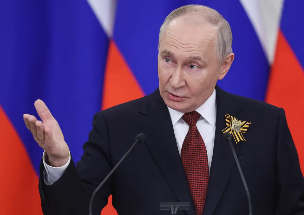 Russian President Vladimir Putin speaking to the media at the Kremlin.