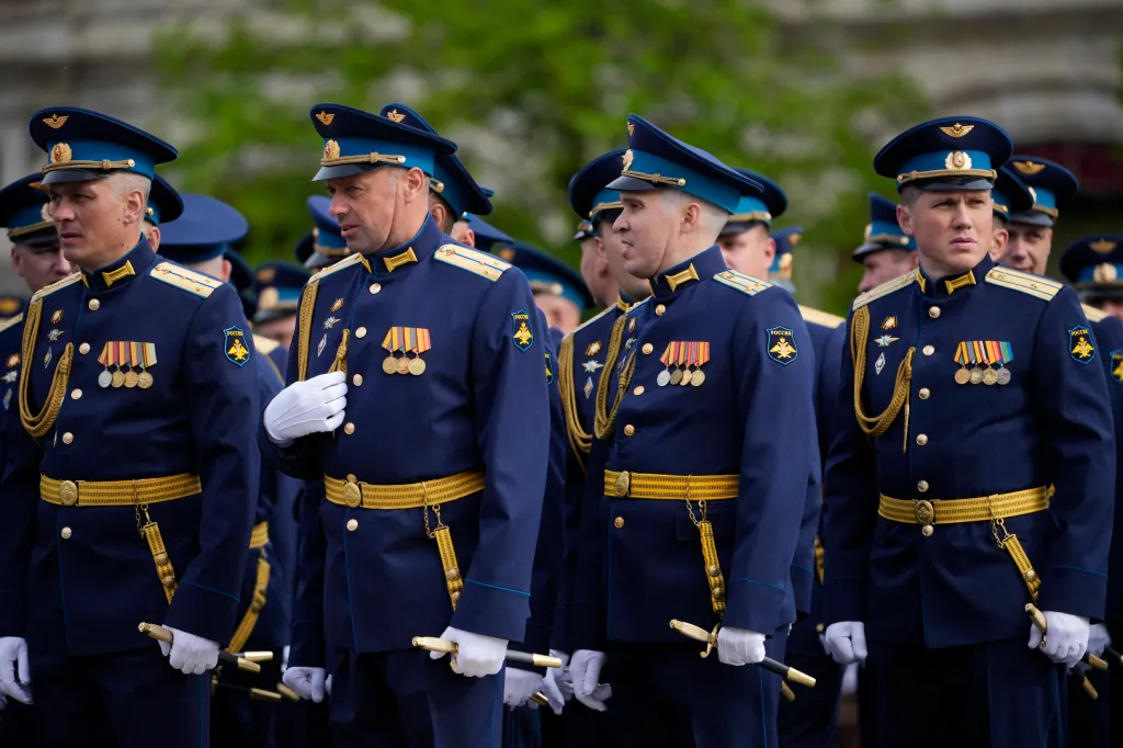 Russian servicemen in uniform standing in formation for the Victory Day military parade.