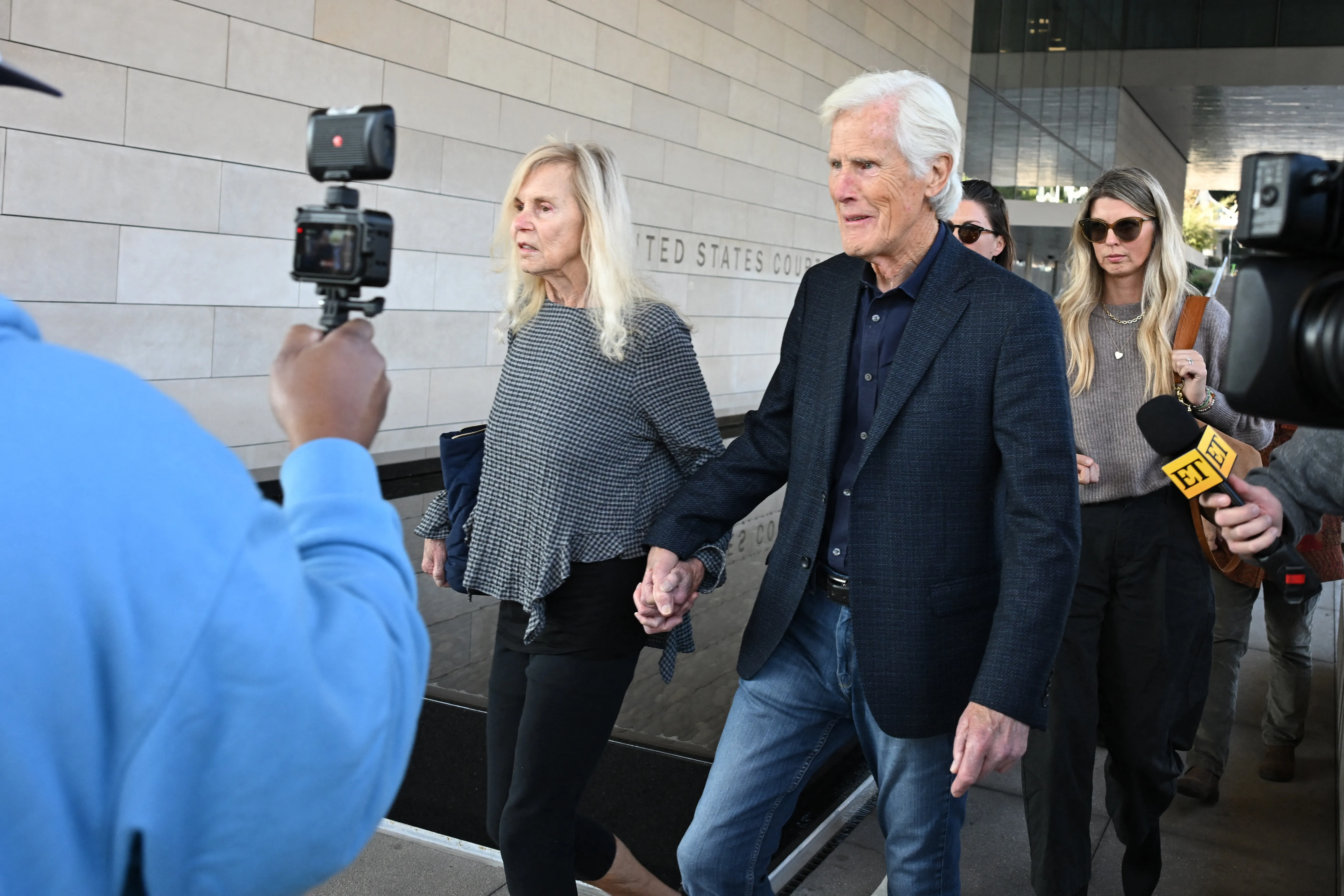 Suzanne Perry and Keith Morrison leaving the United States District Court.