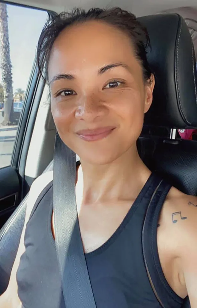 Photo of missing mom Maya Millete, smiling in a car.