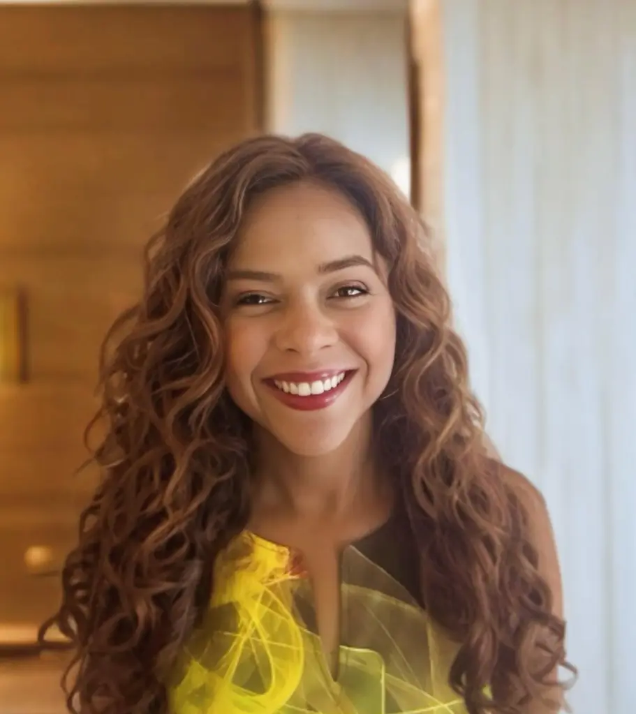 Lark Voorhies smiling.