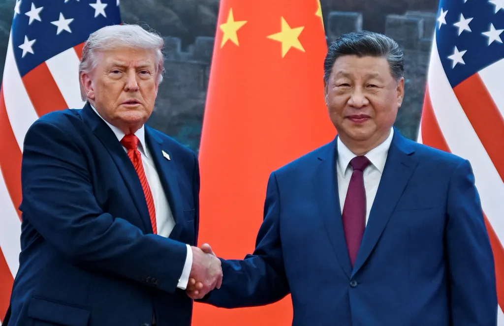 Trump and Xi pose for photos during a welcome ceremony at the Great Hall of the People on May 14, 2026.
