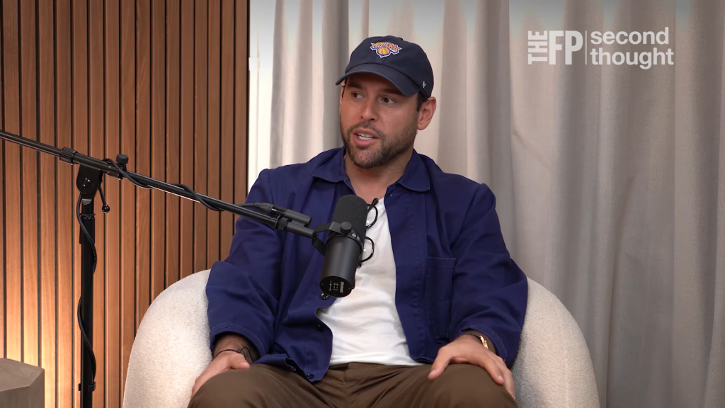 Scooter Braun speaking into a microphone.