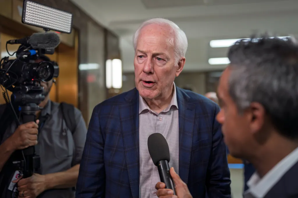 Senator John Cornyn speaking to reporters.