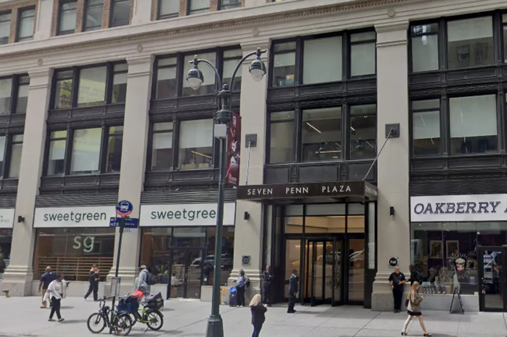 Exterior view of Seven Penn Plaza in New York City with Sweetgreen and Oakberry storefronts.