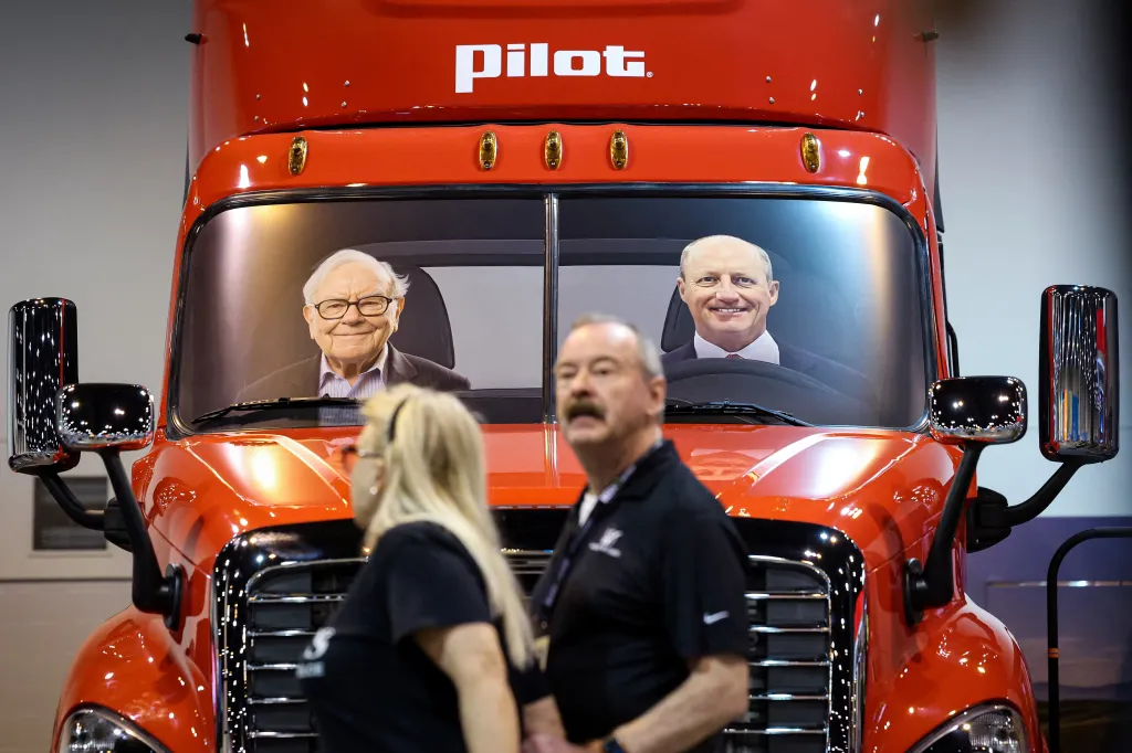 Warren Buffett and Greg Abel's faces on a Pilot truck at the Berkshire Hathaway Inc. annual shareholders' meeting.