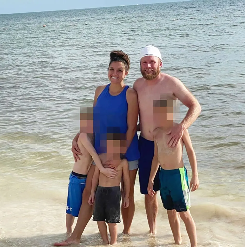 Kouri and Eric Richins with their three sons.