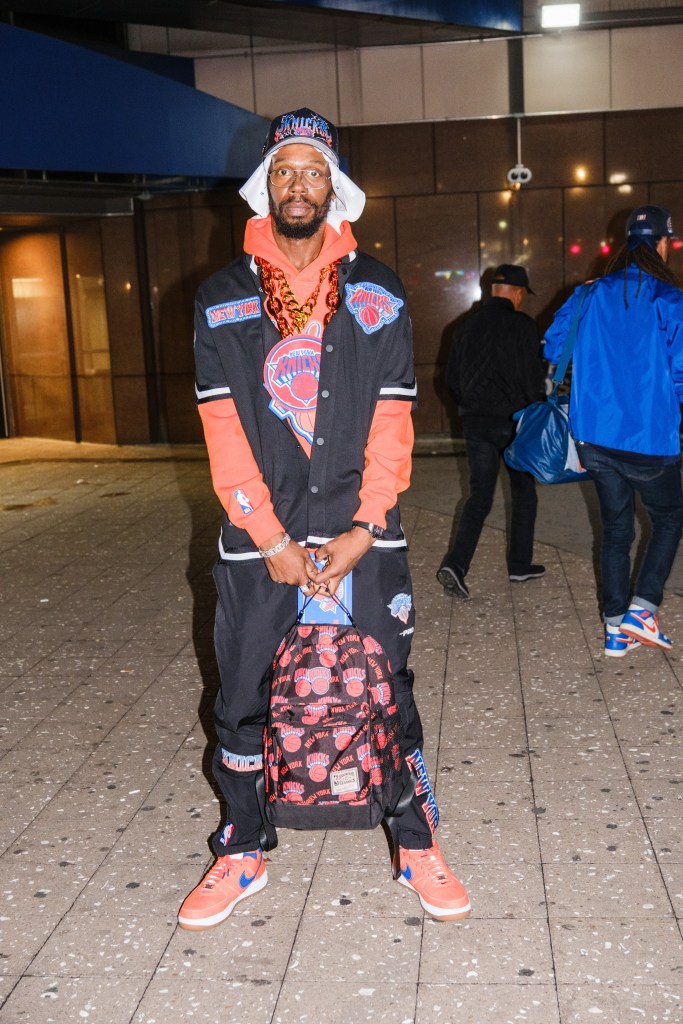 Sincere Parson, 43, wearing Knicks fan gear outside Madison Square Garden.