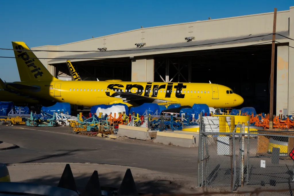 A yellow Spirit Airlines plane parked at Phoenix Goodyear Airport after the airline shut down.