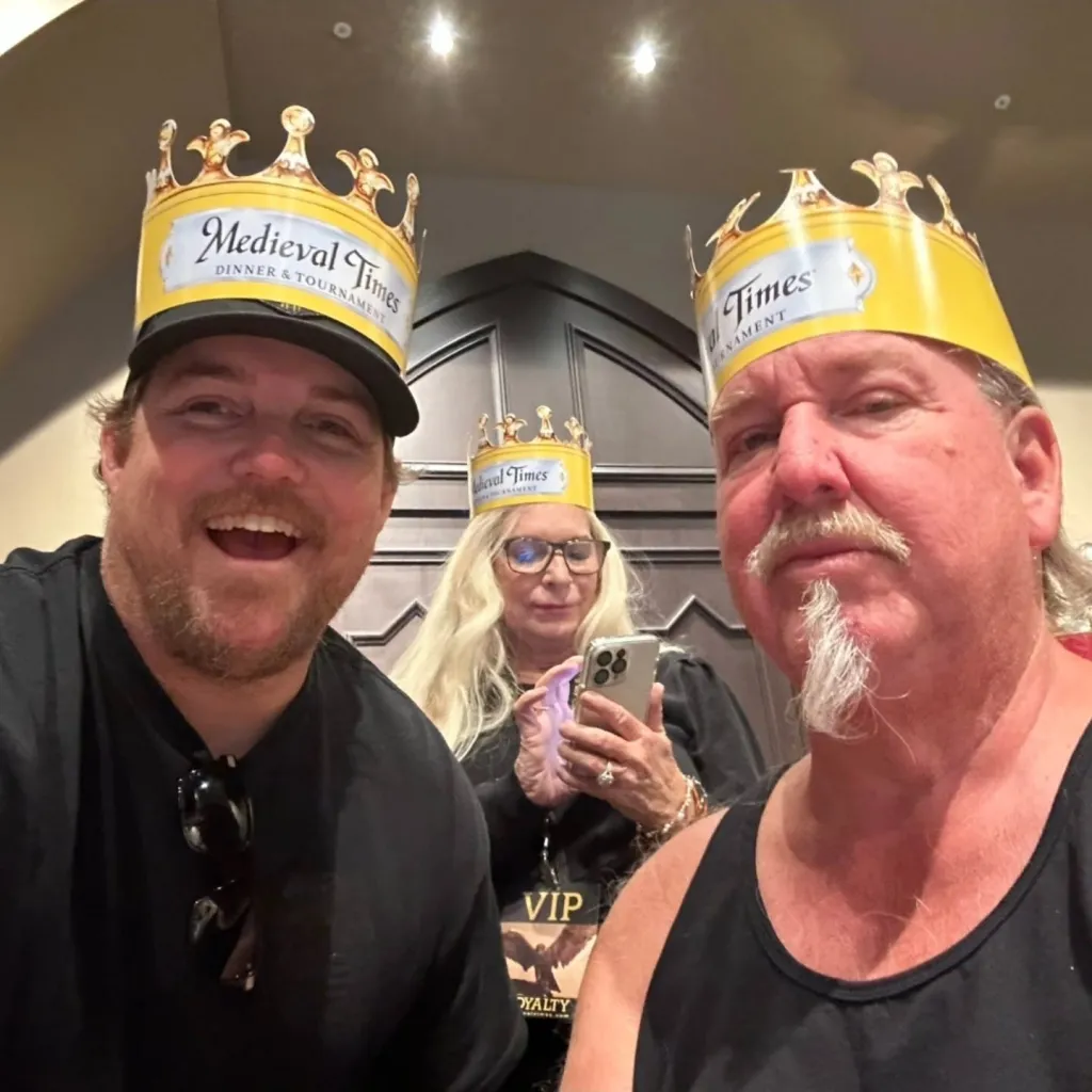 Brandon Sheets and Darrell Sheets wearing paper crowns with 