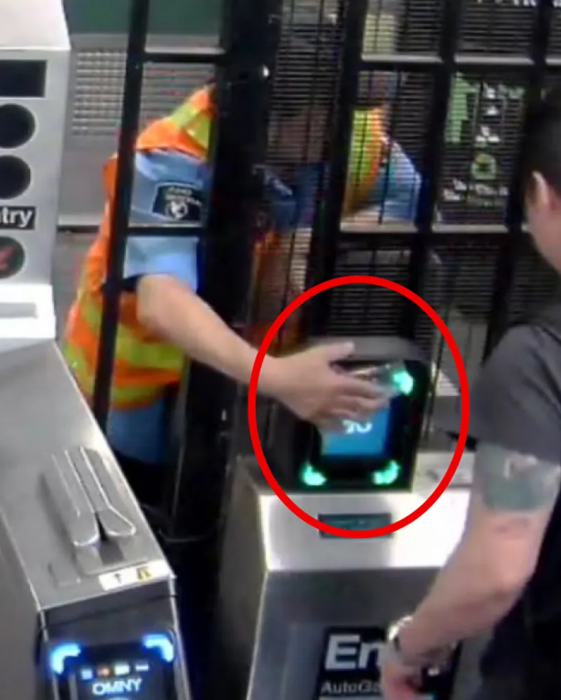 A subway security guard uses an OMNY fare card to swipe a straphanger into the system.