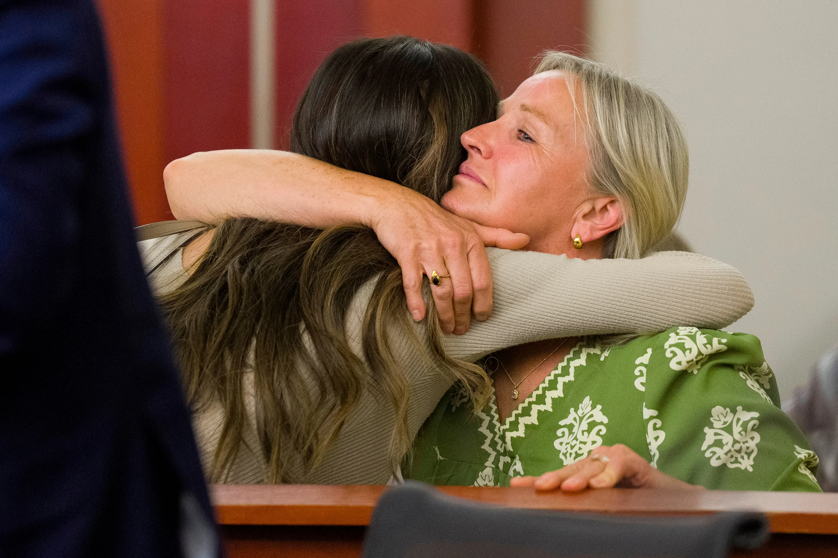 Taylor Frankie Paul and Cheyenne Cranford Mortensen hug in court.