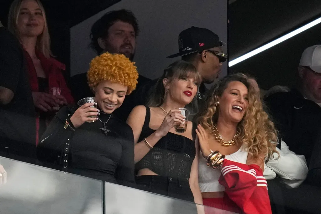 Ice Spice, Taylor Swift, and Blake Lively watching the Super Bowl.