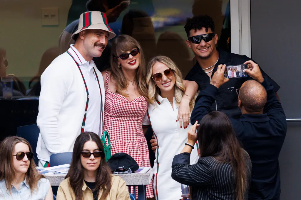 Taylor Swift and Travis Kelce pose for a photo with Patrick Mahomes and Brittany Mahomes at the US Open.