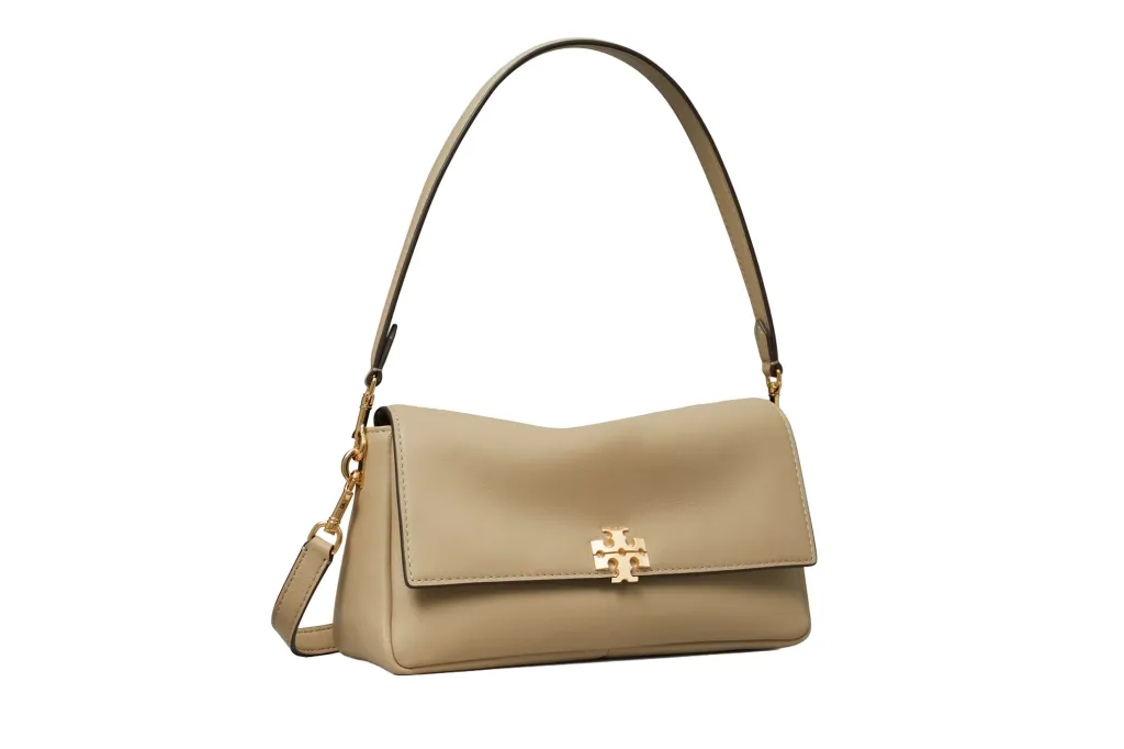 A beige leather shoulder bag with a gold logo on the front flap.