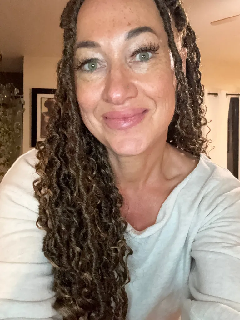 Rachel Dolezal smiling at the camera.
