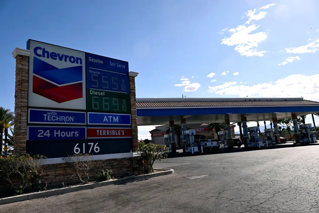 A gas station sign for Chevron and Terrible's showing regular gasoline at $5.55 and diesel at $6.69.