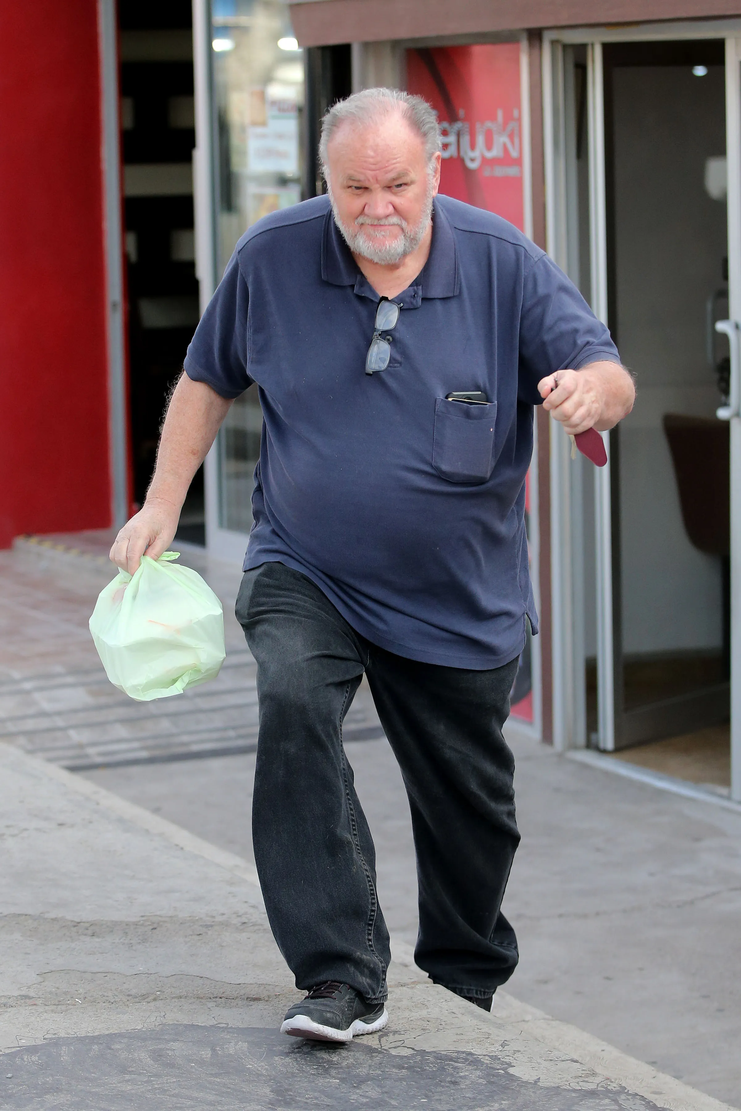 Thomas Markle carrying a to-go order from a Japanese restaurant in Rosarito, Mexico.