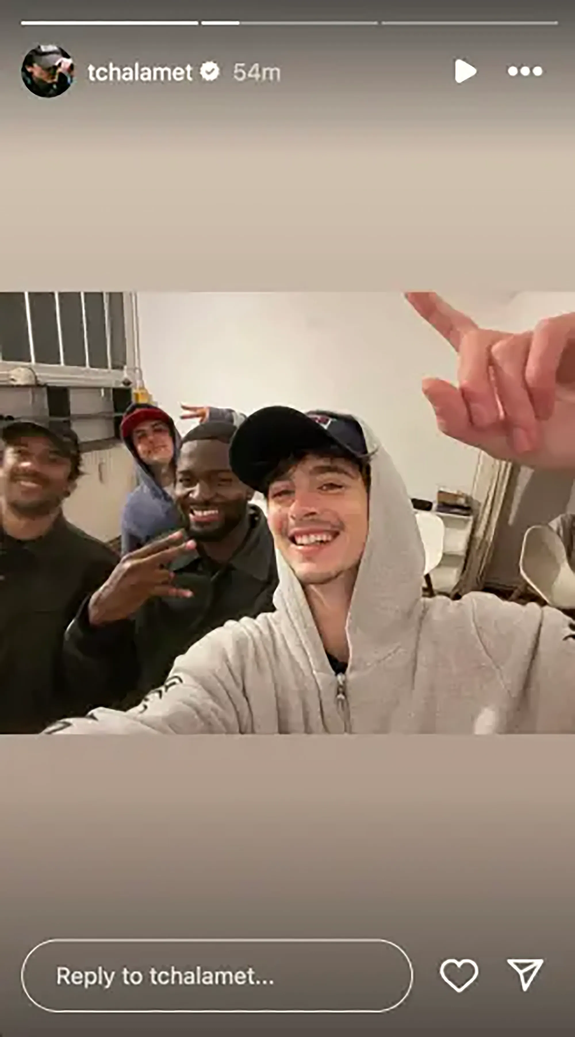 Timothée Chalamet posing in a selfie with four other men.