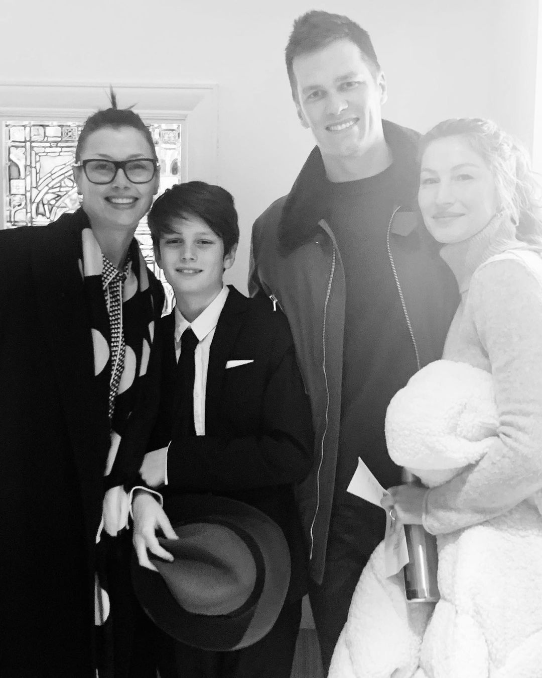 Tom Brady and Gisele Bündchen with their son and another woman.