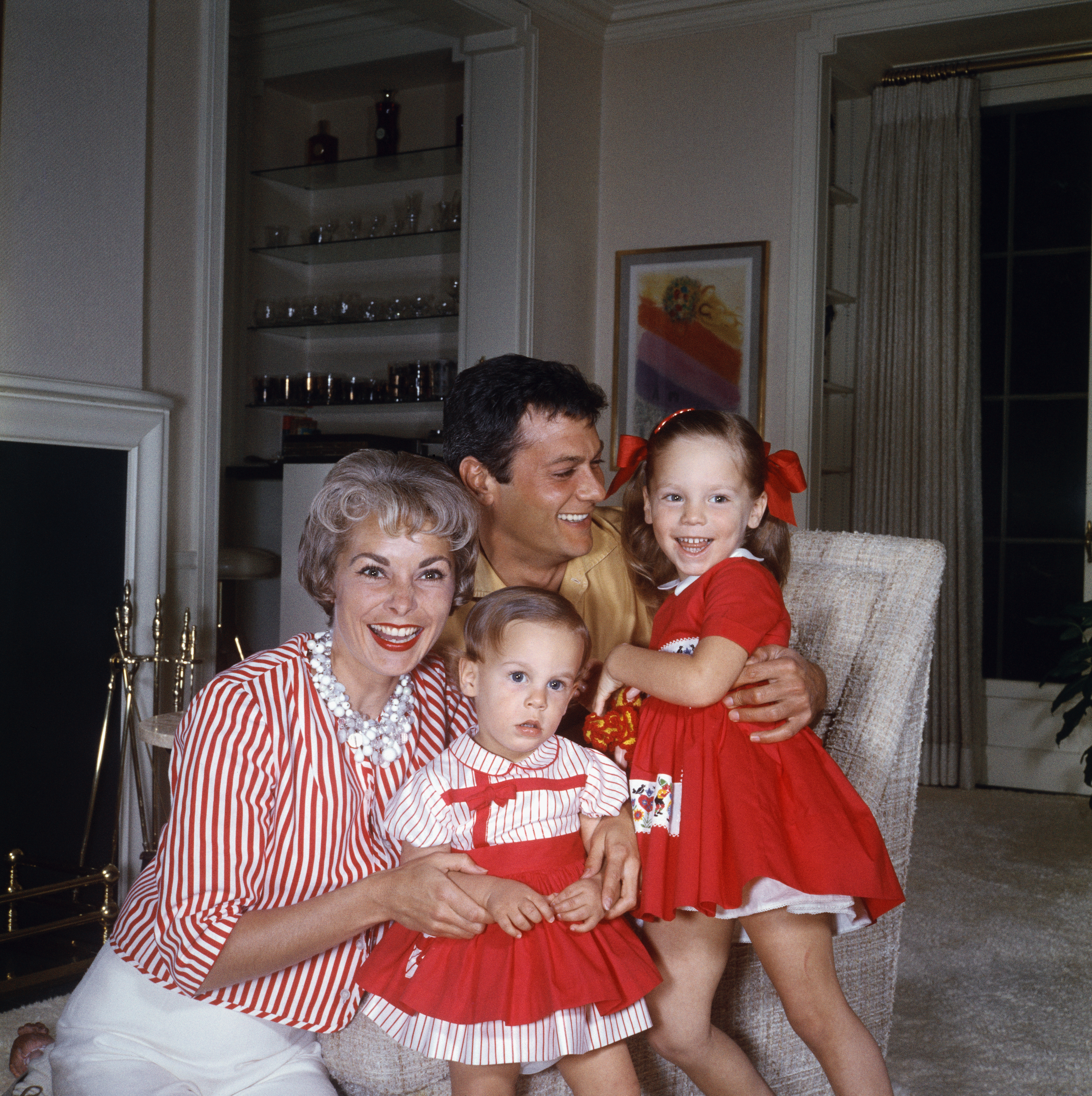 Tony Curtis and Janet Leigh with their two daughters, Jamie Lee and Kelly Lee.