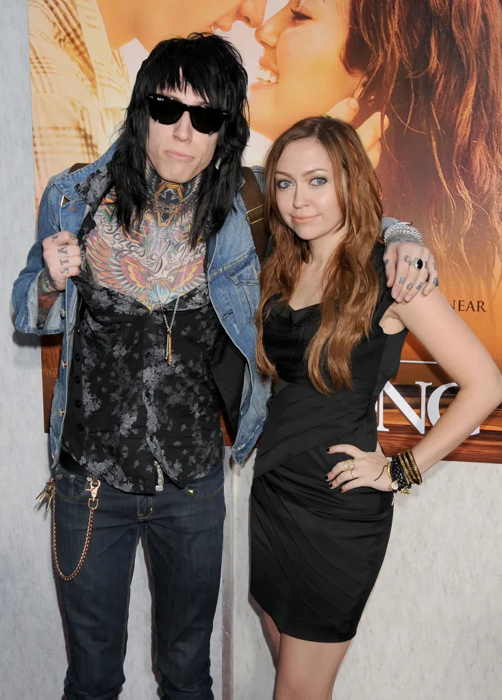 Trace Cyrus and Brandi Cyrus on the red carpet.