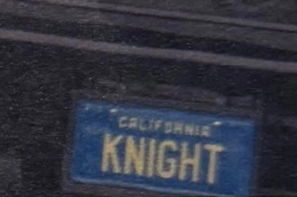 A close-up of a novelty California license plate that reads 