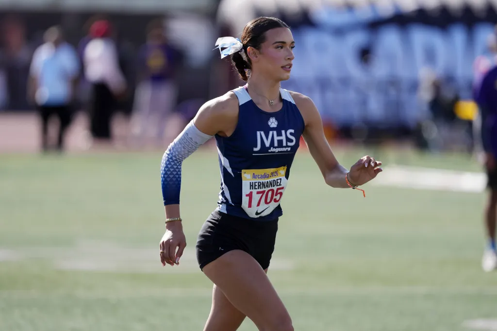 Transgender athlete AB Hernandez competes in the invitational girls high jump.