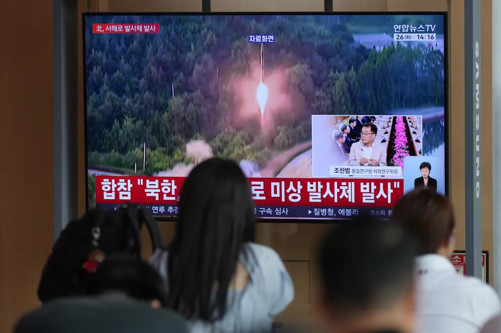 A TV screen shows a reporting of North Korea's unidentified projectile, with file footage during a news program at the Seoul Railway Station in Seoul, South Korea, Tuesday, May 26, 2026.