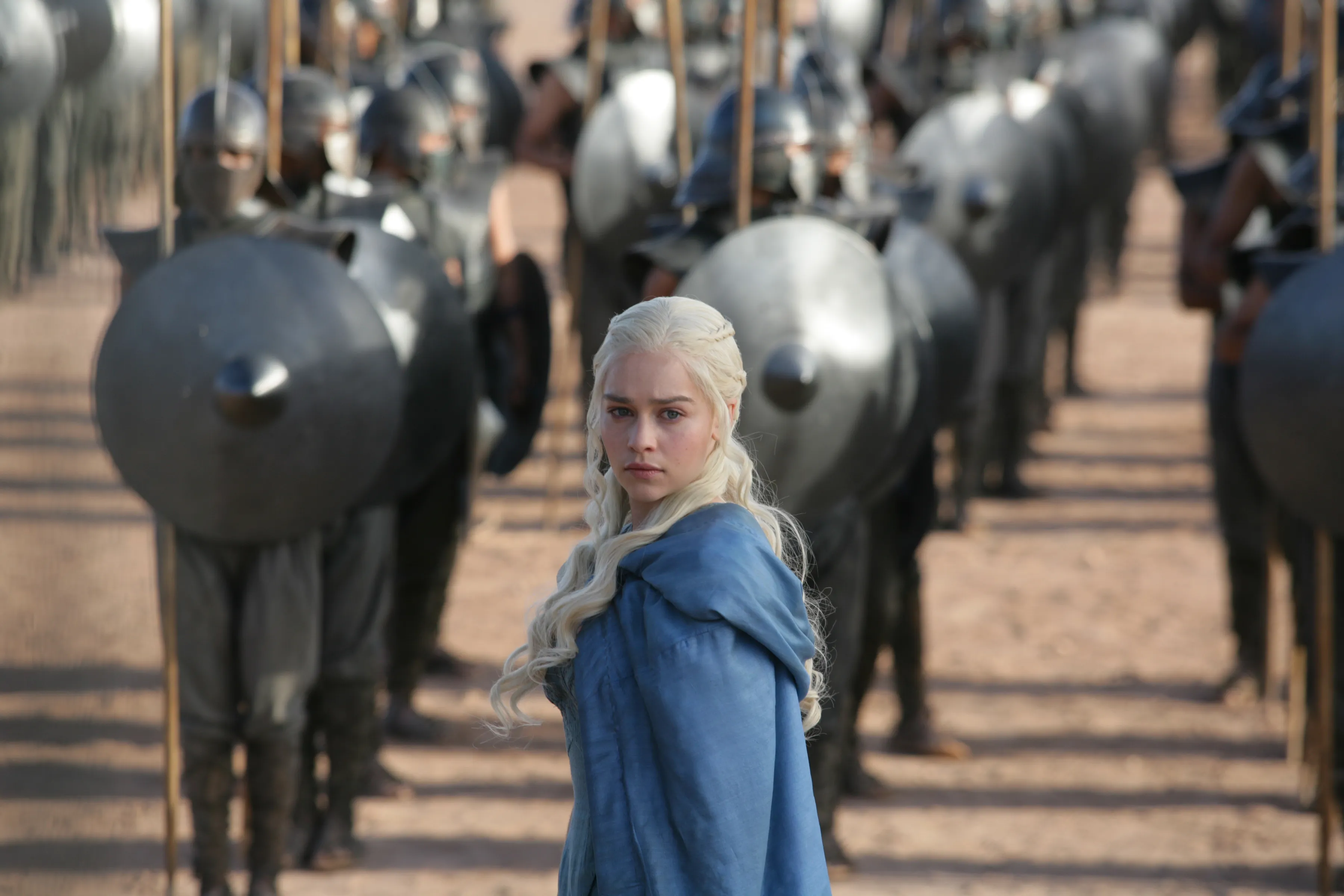 Daenerys Targaryen stands in front of rows of Unsullied soldiers.