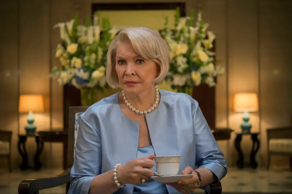 Ellen Burstyn, as Claire Underwood's mother, sitting while holding a teacup and saucer.